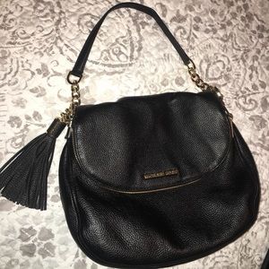Black leather MK purse.